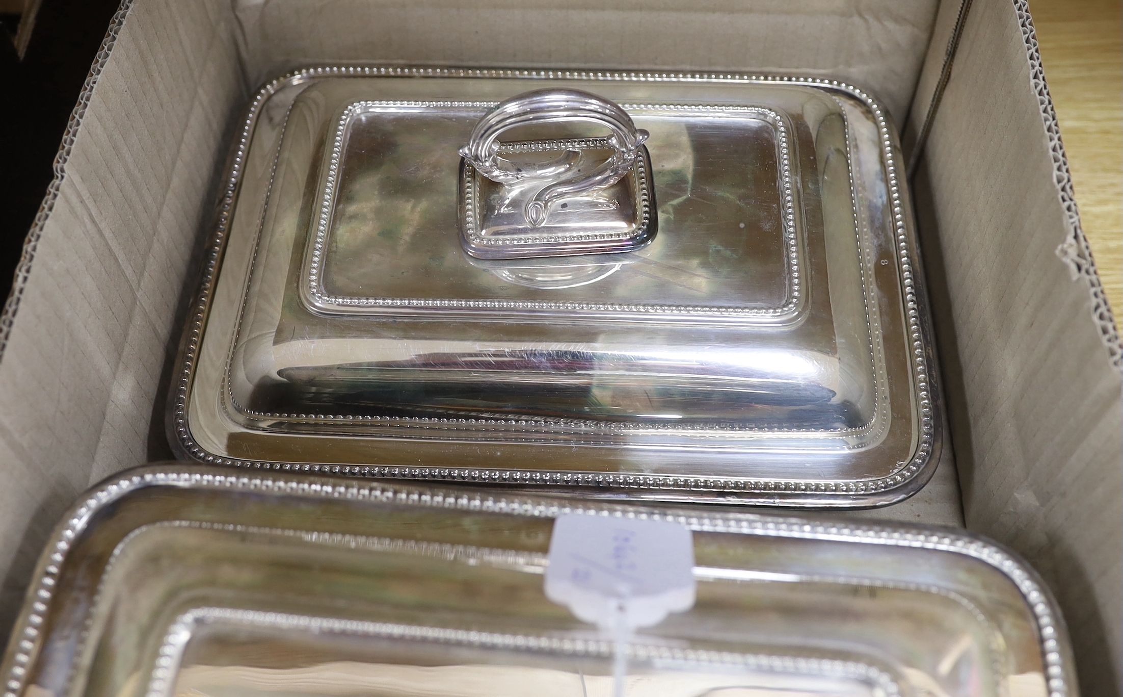 Sundry plated wares including two breakfast dishes, wine coasters and candle wick trimmers, largest 35cm wide